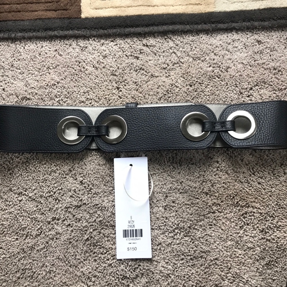 Adjustable black belt. Size small from Etcetera.